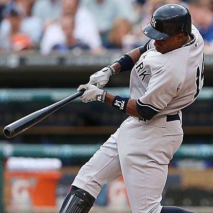 Dropped in the lineup, a struggling Curtis Granderson connects for his 30th homer of the season in the Yankees' win. (Getty Images)