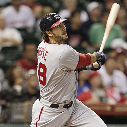 Michael Morse connects for two homers and extends his hitting streak to 18 games in the Nationals' win over the Astros. (Getty Images)