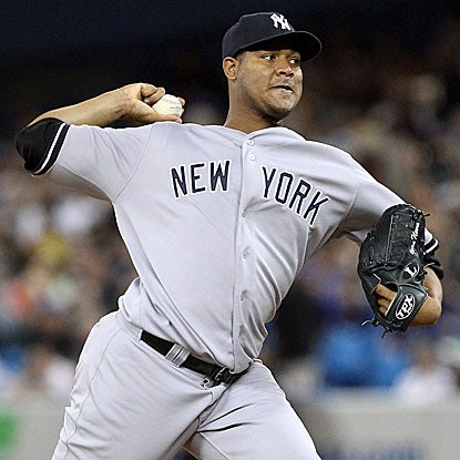 The Yanks' Ivan Nova allows two runs and five hits in 7 1/3 innings to beat the Blue Jays and end a five-start winless streak. (Getty Images)