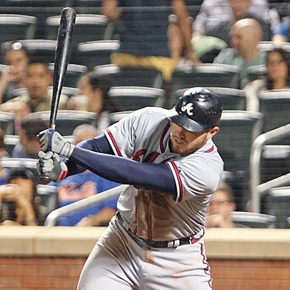 Freddie Freeman tallies five RBI in the first two innings of the game as the Braves cruise past the Mets.  (US Presswire)