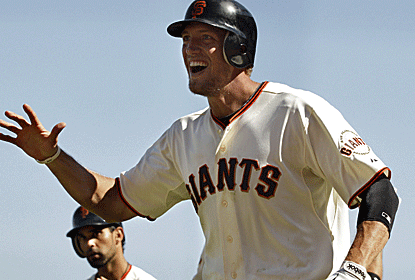 Hunter Pence's eighth-inning three-run homer snaps the tie and sends the Giants to a dramatic victory.  (US Presswire)