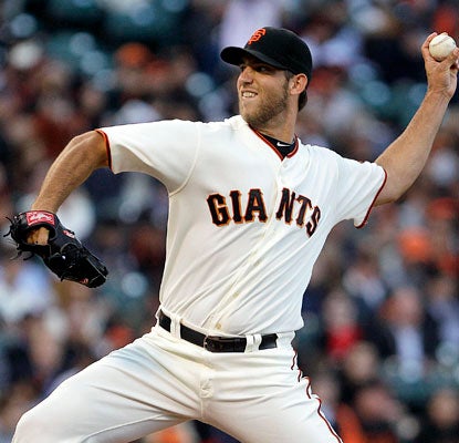 Giants starter Madison Bumgarner pitches a five-hit complete game, striking out six and walking one.  (AP)