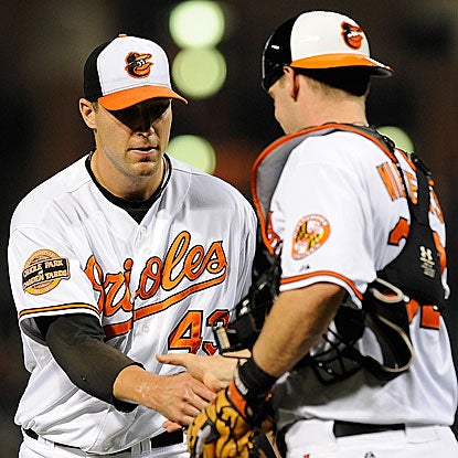 Jim Johnson nails down his 35th save as the O's win and move a game ahead of the Rays for the top AL wild-card spot. (Getty Images)