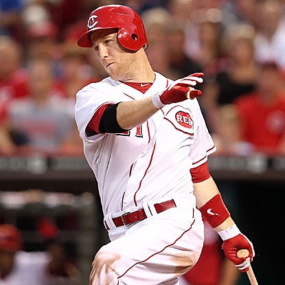 Todd Frazier contributes a 2-run homer to the Reds' offensive attack that sinks the Cubs in the opener of a four-game series.  (Getty Images)