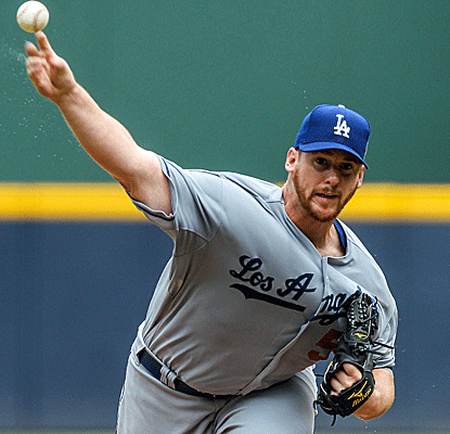 Dodgers starter Chad Billingsley gives up just three hits over seven innings to earn his 10th win of the year.  (US Presswire)