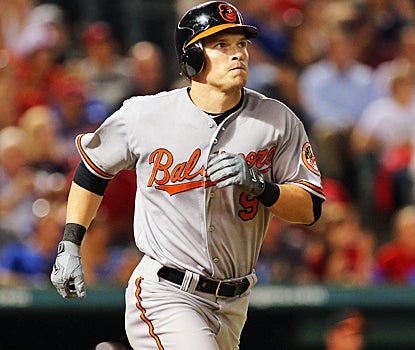 Nate McLouth's homer helps the Orioles stay a game behind the Rays in the wild card race. (US Presswire)