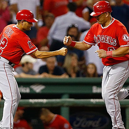 Kendrys Morales helps brings the Angels back with a tie-breaking home run in the 10th inning. (Getty Images)