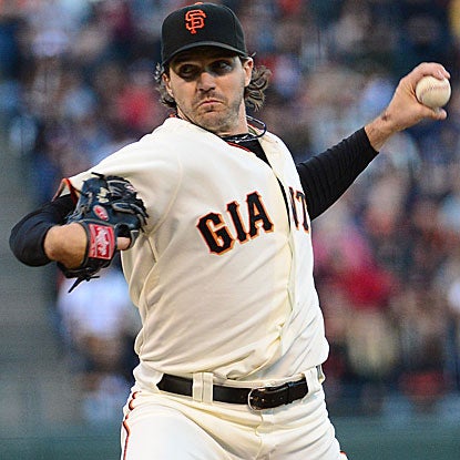 Barry Zito strikes out five and allows two earned runs in eight-plus innings to lead the Giants past the Braves. (US Presswire)