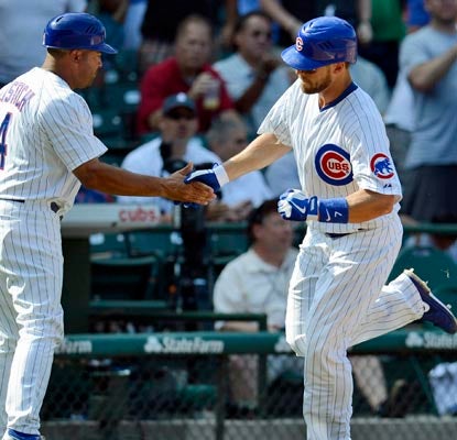 Brett Jackson leads off the decisive eighth inning with a home run that ties the score at 3-3.   (US Presswire)