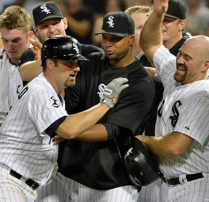 Paul Konerko does his part to save the White Sox from a deflating loss with his game-winning hit in the ninth.  (Getty Images)