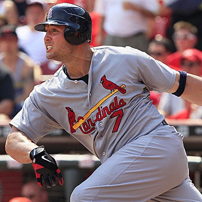 Matt Holliday goes 4 for 5 with four RBI to lead the Cards past the Reds, closing their gap to six games in the N.L. Central. (AP)