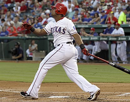 Adrian Beltre follows through on his solo home run in the second inning off David Price. He finishes 3 for 3. (AP)