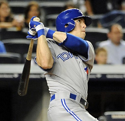 The Jays' Colby Rasmus connects on a three-run blast in the ninth to blow the Yankees' lead. (AP)