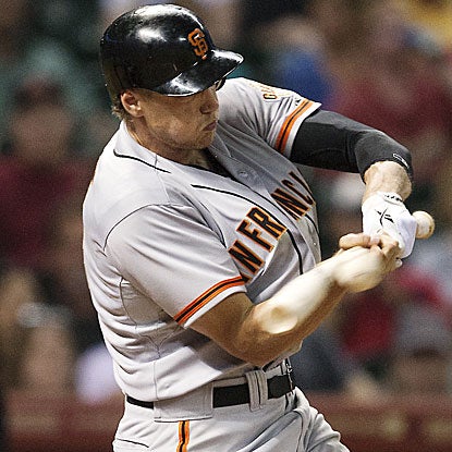 Hunter Pence delivers a go-ahead two-run single in the seventh inning to help the Giants overcome an earlier 4-0 deficit.  (Getty Images)