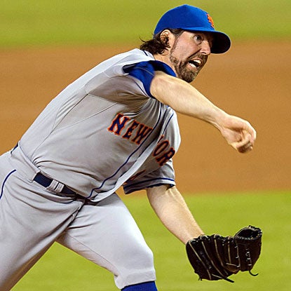 The Mets' R.A. Dickey throws his NL-leading fifth complete game to earn his 17th win, tying him for the MLB lead. (US Presswire)
