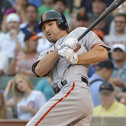 Called up from Triple-A Saturday, Xavier Nady delivers a three-run double for the Giants in his first MLB game of the year. (Getty Images)