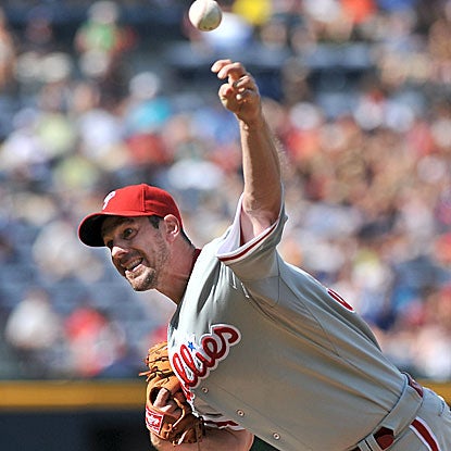 Cliff Lee allows five hits and strikes out five in seven shutout innings to lift the Phillies over the Braves. (AP)