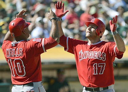 Vernon Wells and Chris Iannetta combine for five hits, five RBI and two home runs in the win over Oakland. (Getty Images)