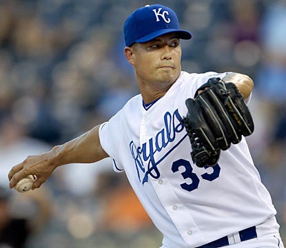 Jeremy Guthrie does more than enough to tame the hard-hitting Rangers, yielding just two runs in seven innings. (AP)