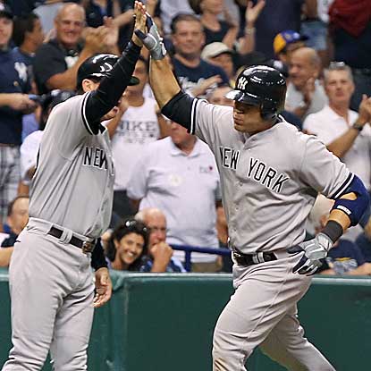 Russell Martin homers and collects three RBI as the Yankees defeat the Rays and regain sole possession of the AL East lead. (US Presswire)