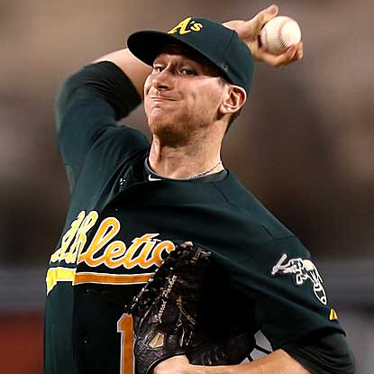 The A's Jarrod Parker throws seven innings of three-hit ball to defeat the Angels and snap their six-game winning streak. (Getty Images)