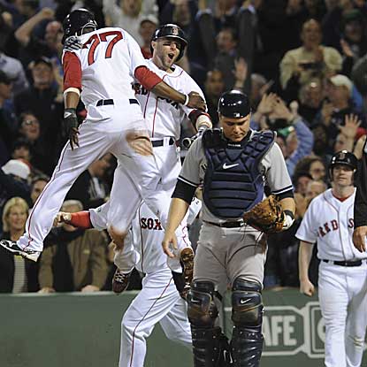 Jacoby Ellsbury's ninth-inning single drives in Pedro Ciriaco (77) as the winning run, putting the Red Sox over the Yankees. (US Presswire)