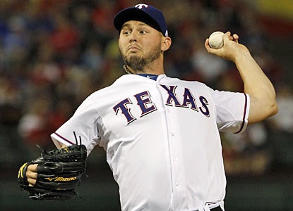 Matt Harrison does enough to earn his 16th win of the season, becoming the fourth AL pitcher to do so. (AP)
