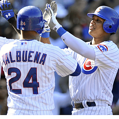 Starlin Castro (right) goes 2 for 4 with a three-run homer as the Cubs defeat the Pirates for the fourth consecutive time. (AP)