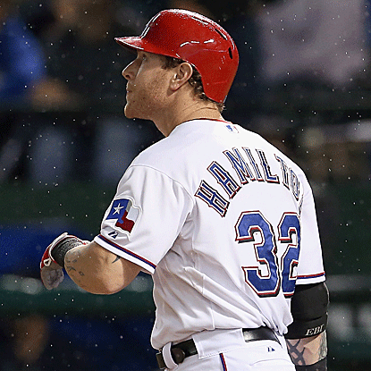 The Rangers' Josh Hamilton homers and drives in two runs to increase his MLB-leading home run total to 42 and RBI total to 123. (Getty Images)