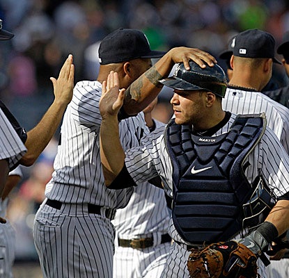 Catcher Russell Martin gets the Yankees out to an early lead vs. the Rays, hitting a three-run HR in the third inning. (AP)