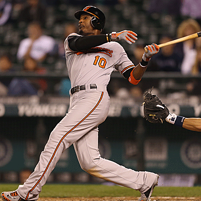 Adam Jones' two-run homer in the top of the 11th inning gives the Orioles their 15th straight extra-inning victory. (Getty Images)