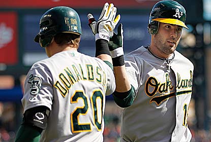 Seth Smith homers, doubles and drives in four runs to help the A's avoid getting swept in Detroit. (Getty Images)