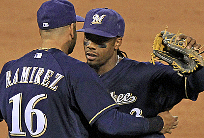 Rickie Weeks, with a two-run game-tying single, and Aramis Ramirez, with the game-winning hit, lead the Brewers.  (AP)