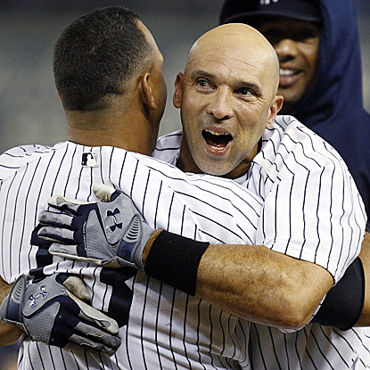 Raul Ibanez leads the Yankees to a dramatic comeback win over the Red Sox, keeping them one game up in the AL East. (AP)