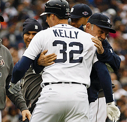 Don Kelly's sacrifice fly in the ninth gives the Tigers the win in Game 2, sending them to Oakland with a 2-0 ALDS lead.  (US Presswire)