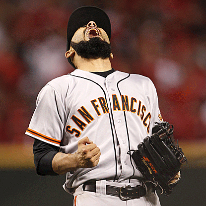 Sergio Romo pitches a perfect ninth and 10th inning to earn the win and keep the Giants' season alive.  (US Presswire)