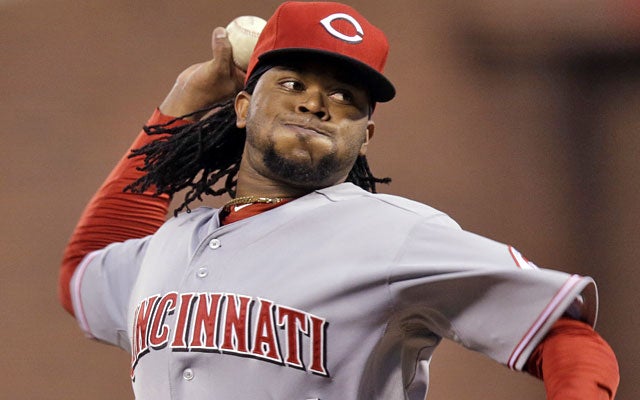 Johnny Cueto, hurt early in Game 1, would be eligible to pitch in the World Series if the Reds make it. (AP)