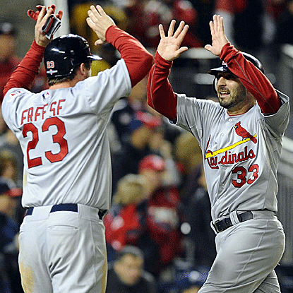 Daniel Descalso homers in the eighth inning and delivers a two-run single in the ninth to help lead the Cards into the NLCS. (US Presswire)