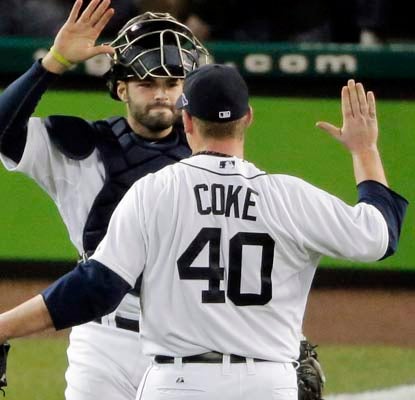 In relief of Justin Verlander, Phil Coke escapes a jam in the ninth inning by striking out Raul Ibanez to end Game 3.  (AP)