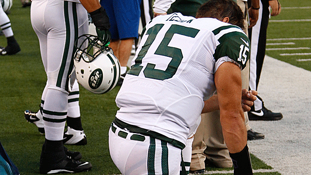 Tim Tebow trademarks his move where he goes down on one knee while praying during games. (US Presswire)