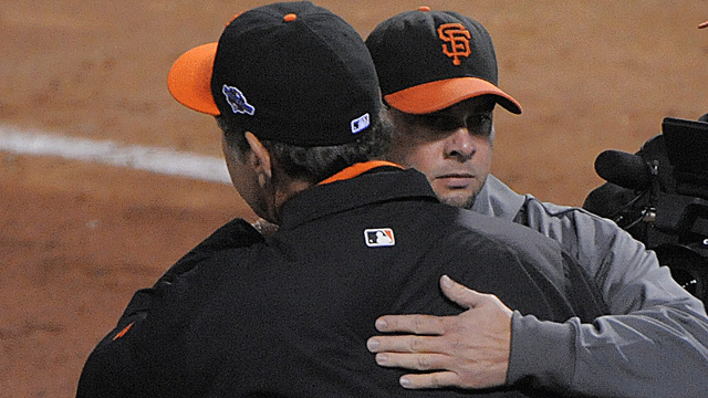 Ryan Vogelsong, hugged by Bruce Bochy after his Game 6 win, is the Giants' unlikely hero. (US Presswire)