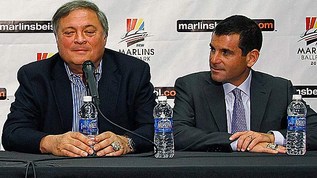 Marlins executives Jeffrey Loria (left) and David Samson have a history of running fire sales. (Getty Images)