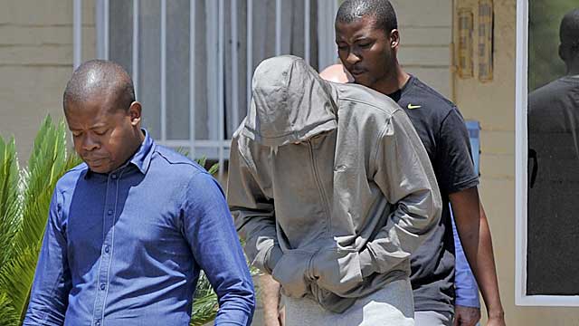 Pistorius leaves the Boshkop police station on Thursday in Pretoria. (Getty Images)