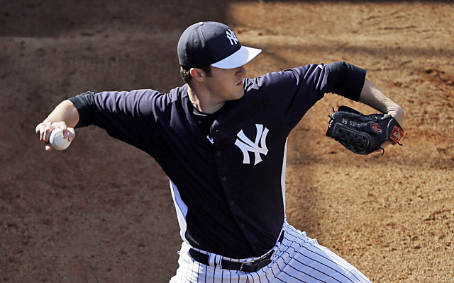 Phil Hughes says he hopes to get back to throwing within about a week. (AP)