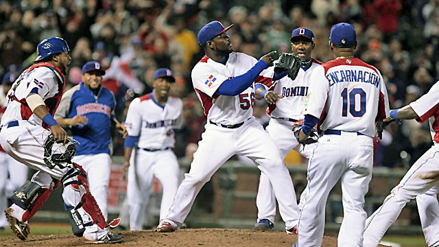 Dominican Republic pitcher Fernando Rodney celebrates with teammates after the win against Netherlands. (USATSI)