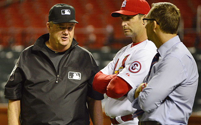 Give Joe West credit for waiting Thursday night, denying the Cardinals a tainted victory. (USATSI)
