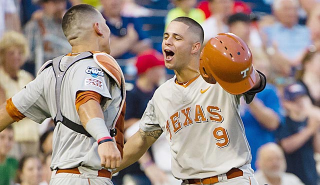 CJ Hinojosa (right) celebrates after hitting only the fourth home run in the past two College WS. (USATSI)
