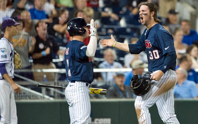 Ole Miss' Will Allen (right) is pumped after batting 3 for 5 with three RBI against TCU. (USATSI)
