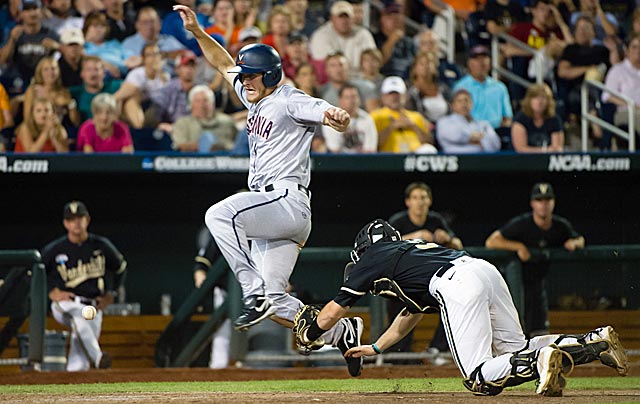 Virginia's Mike Papi scores while Vanderbilt's Jason Delay reaches for an errant throw. (USATSI)