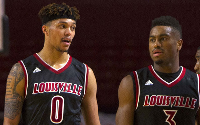 Louisville's Damion Lee, left, and Trey Lewis will miss out on playing in the NCAA tourney. (USATSI)